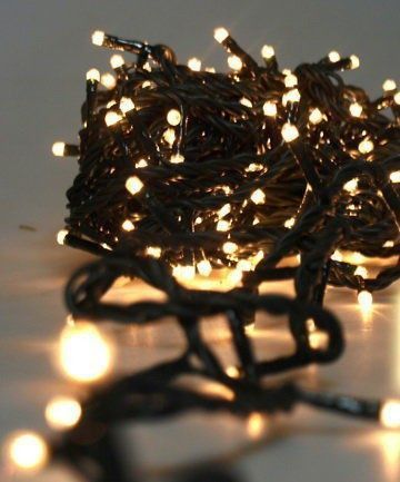Гірлянда-нитка (String-Lights) 100WW-7 внутрішня, з чорним проводом, 7м (Колір: Білий-теплий) 22177 фото