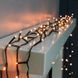 Гірлянда-нитка (String-Lights) 100WW-3 внутрішня, з чорним проводом, 7м (Колір: білий-теплий) 22235 фото 2